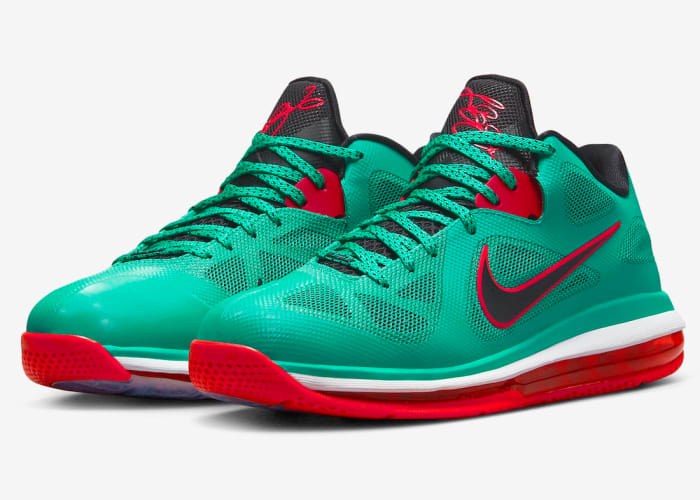 Side view of LeBron James' green and red Nike shoes.